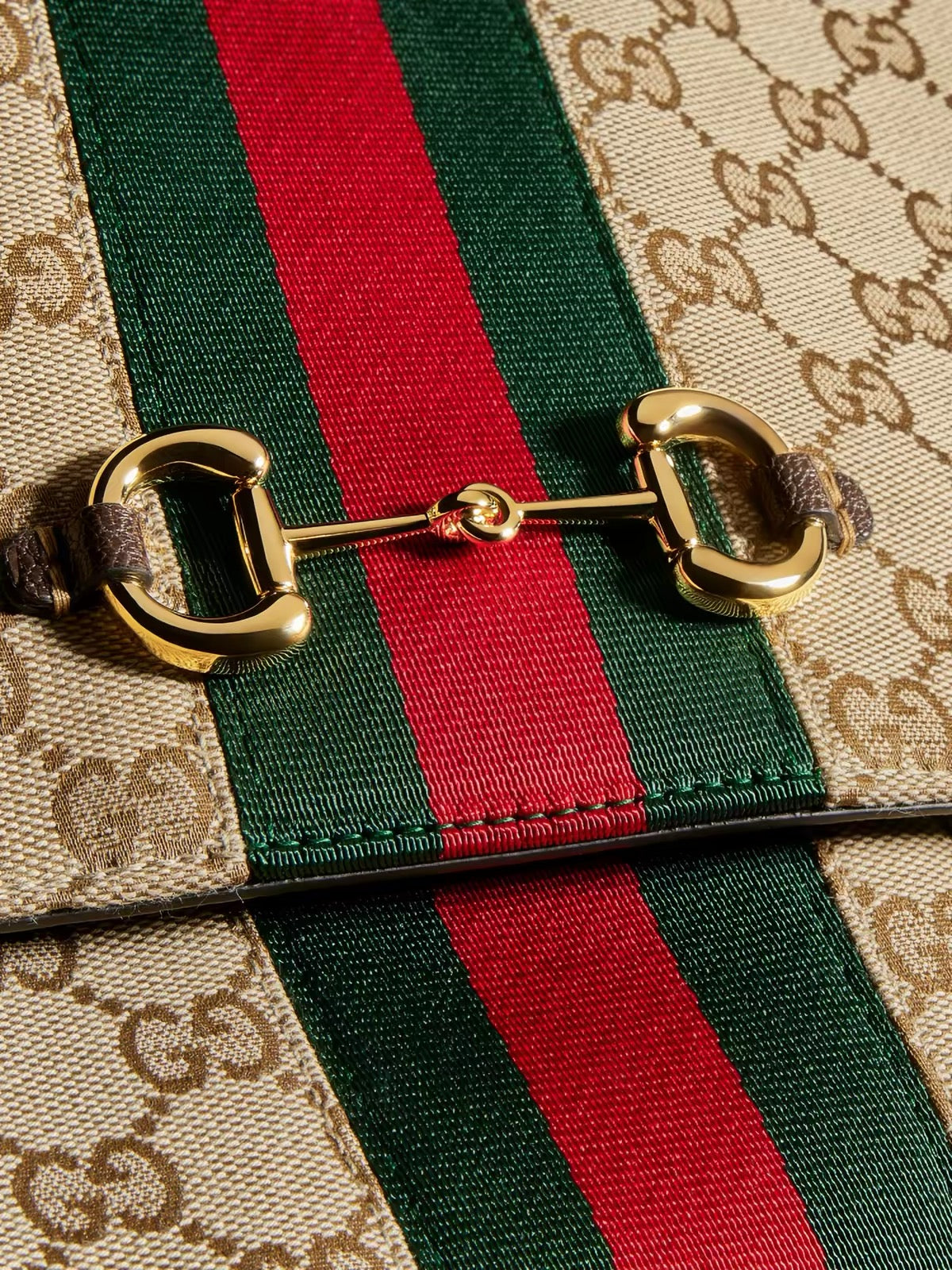Center stripe and gold-tone hardware detail