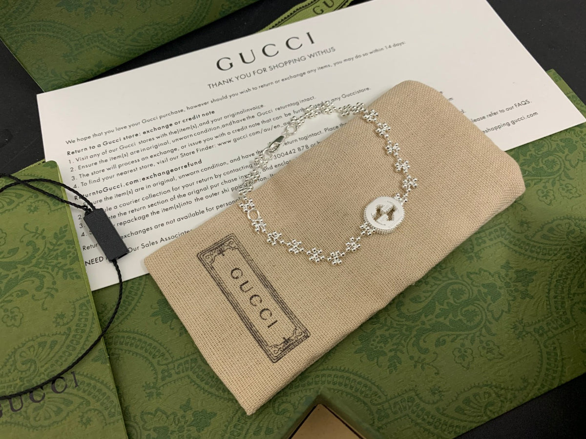 GU Snowflake Charm Bracelet