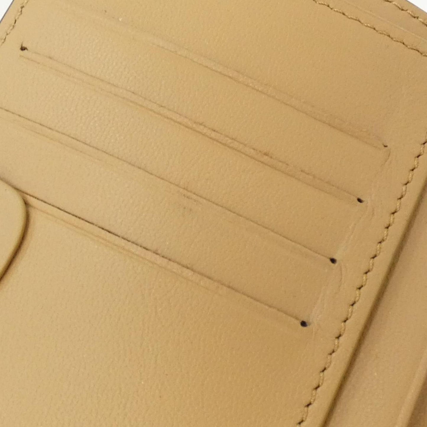 Baguette Continental Wallet Zucca Embossed Leather