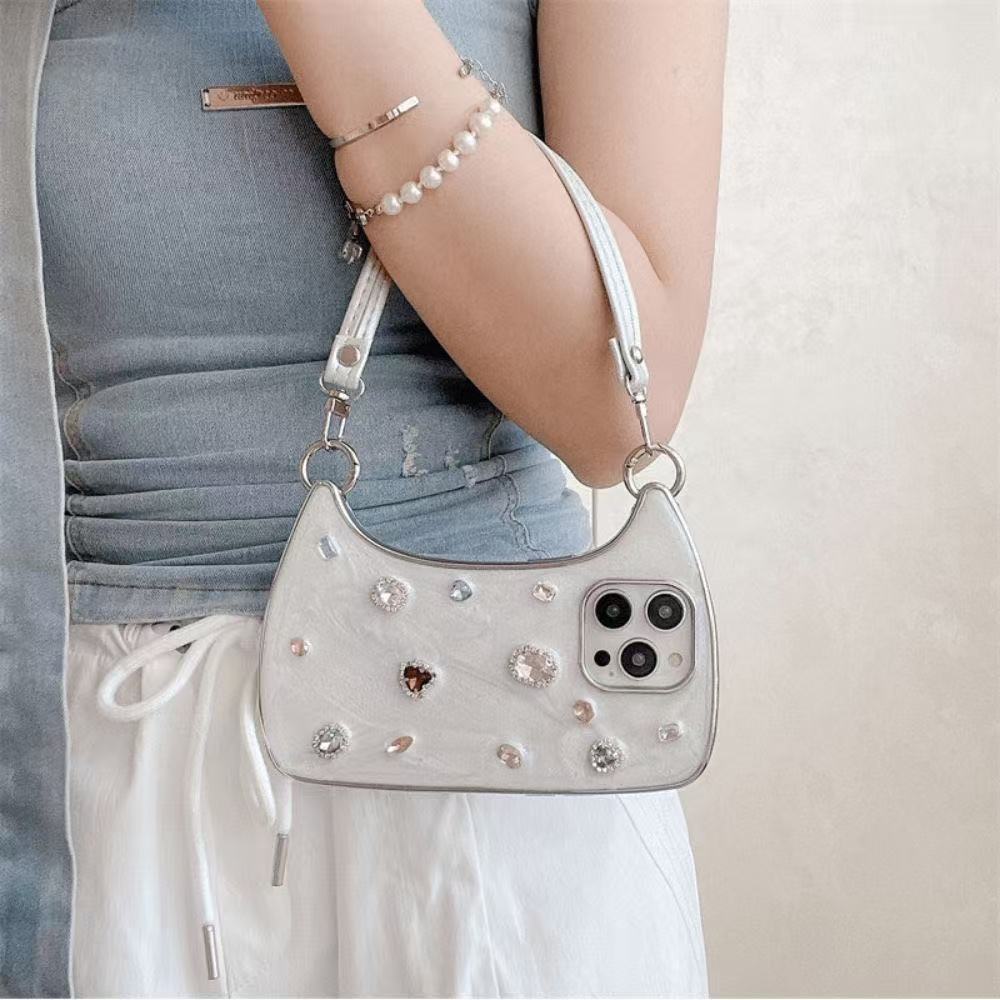 Celeste Jeweled Handbag iPhone Case worn on the shoulder