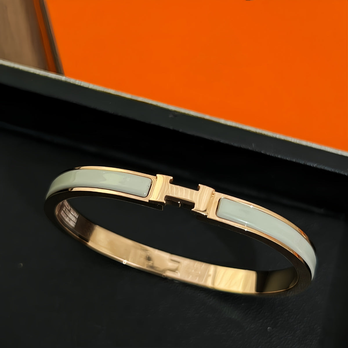 Light blue accent bangle, rose-gold-tone