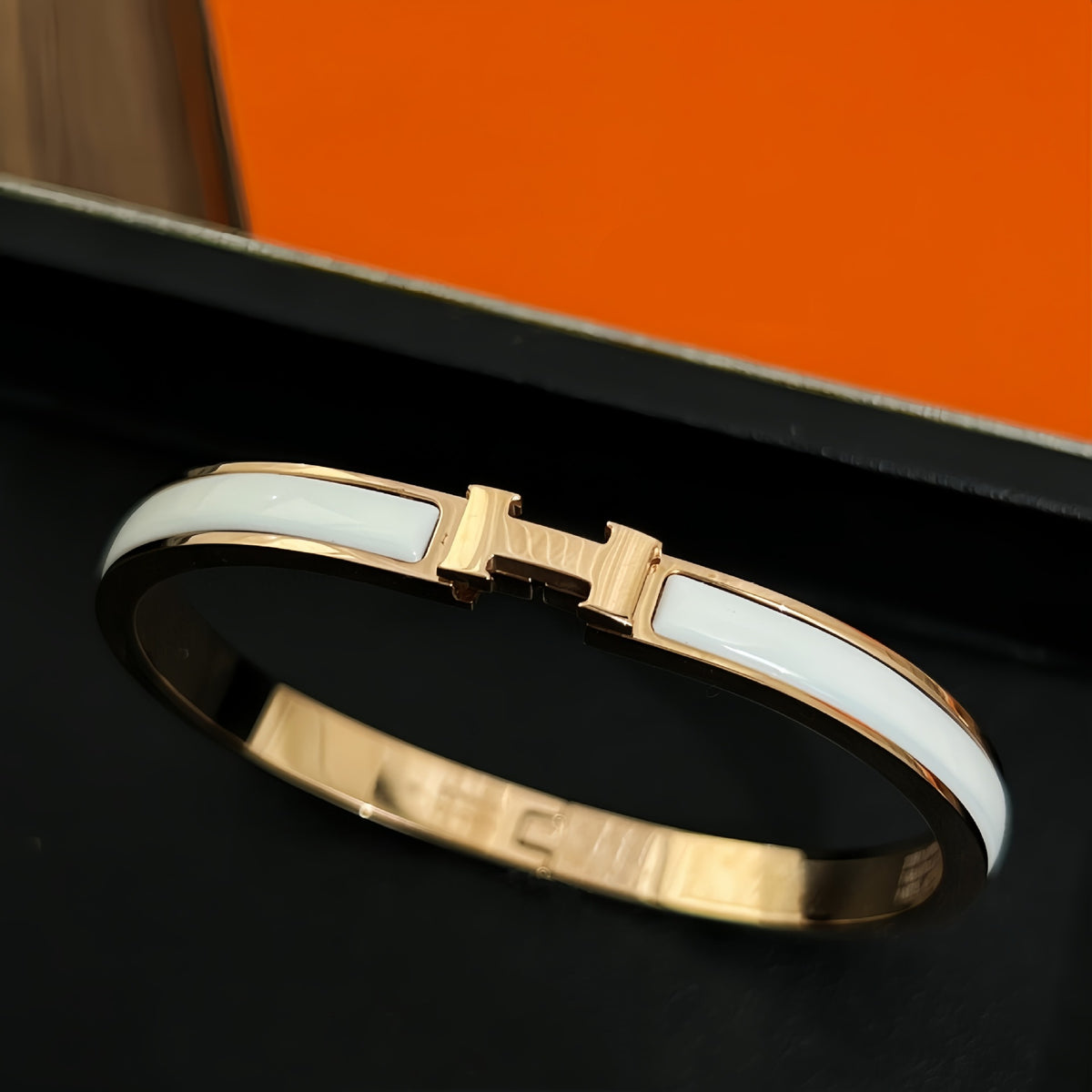 White accent bangle, rose-gold-tone