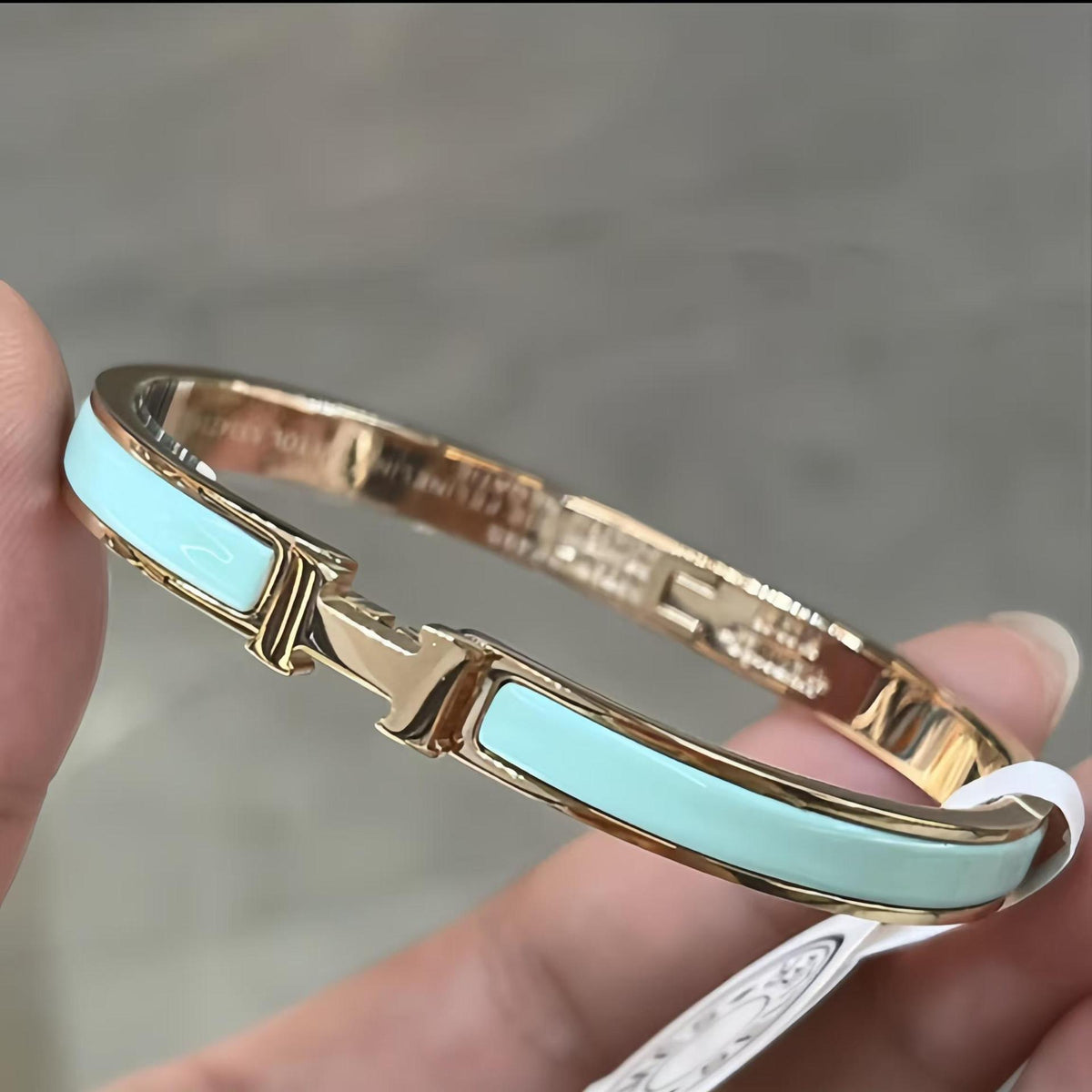 Light blue accent bangle, gold-tone