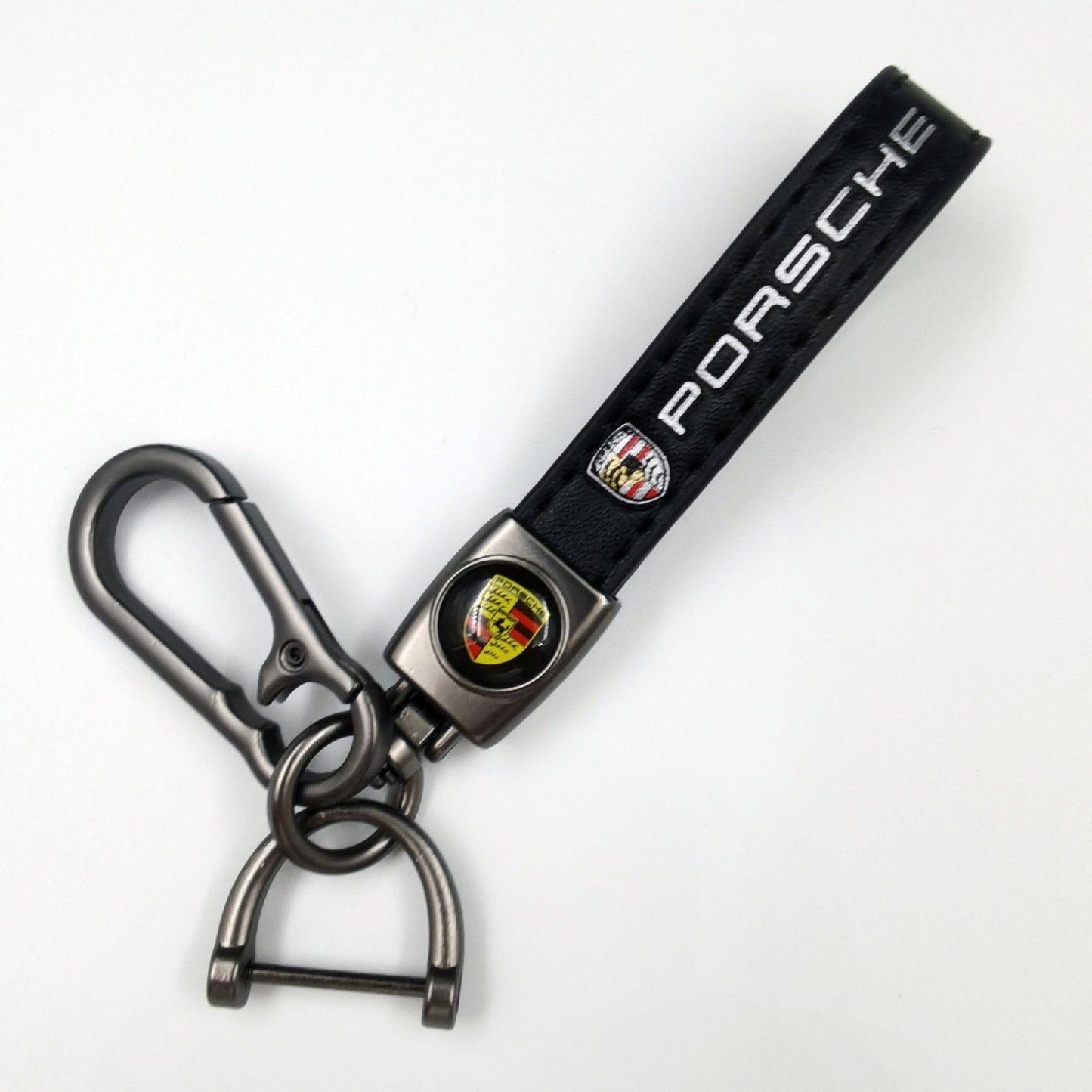 Sleek Black Leather Keychain with Eye-Catching Emblem & Secure Carabiner
