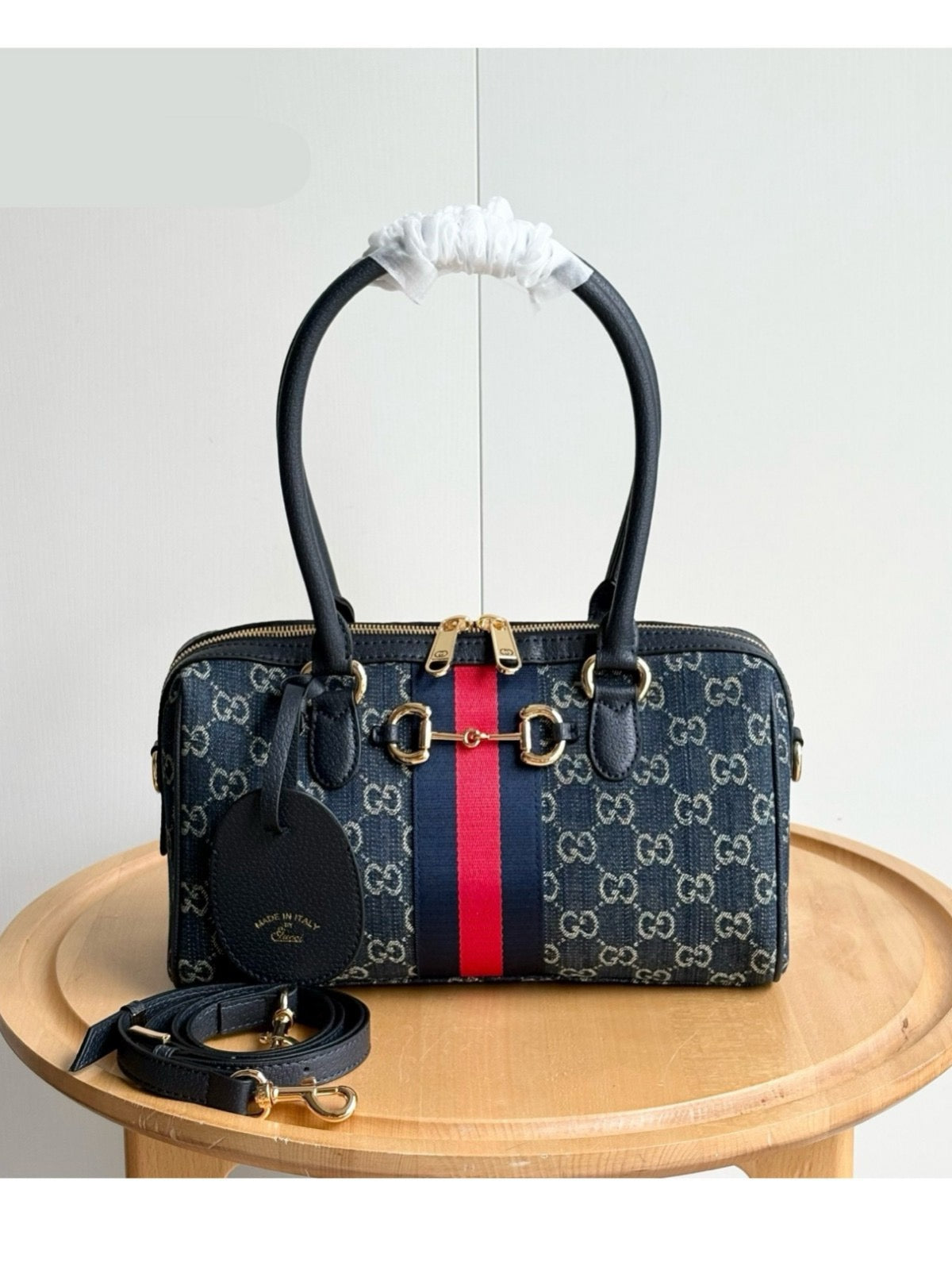 Midnight patterned barrel satchel with contrast stripe
