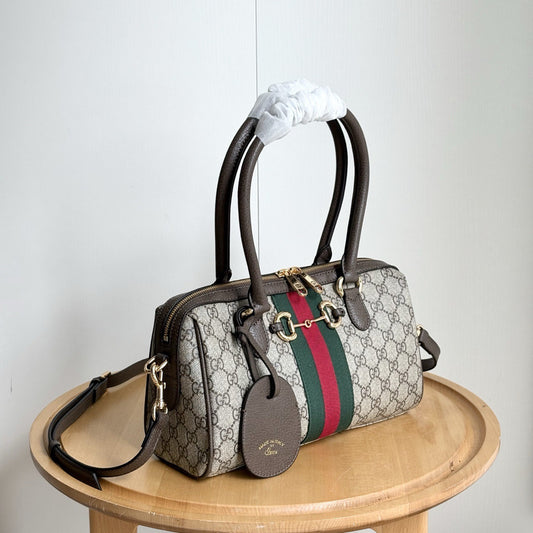 Stone patterned barrel satchel with shoulder strap