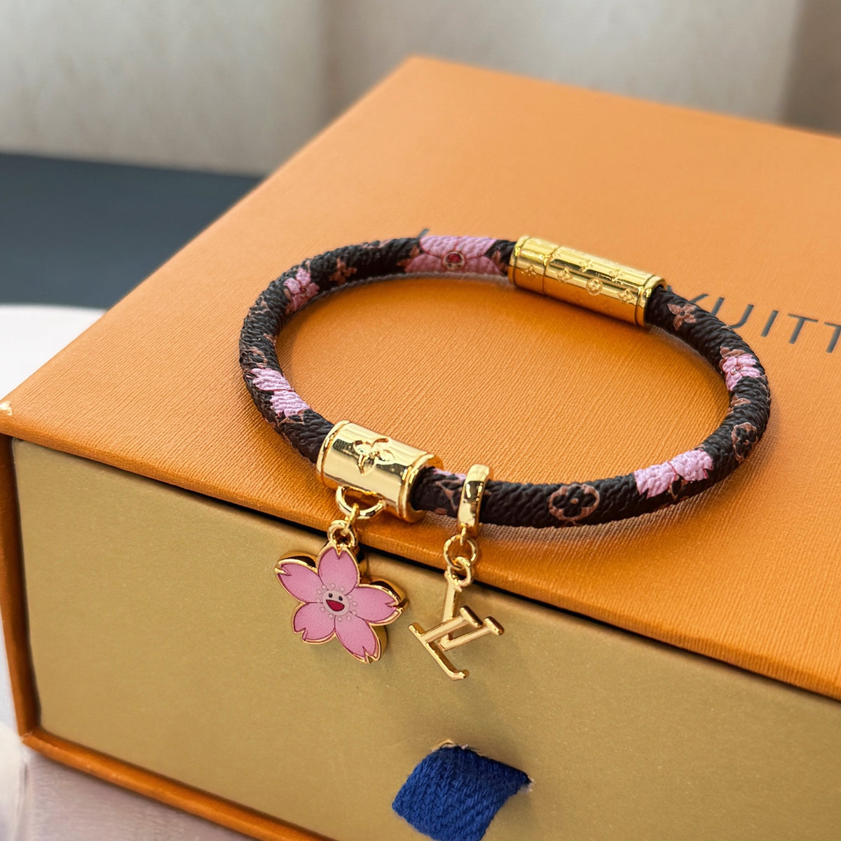 L Blossom Charm Cord Bracelet