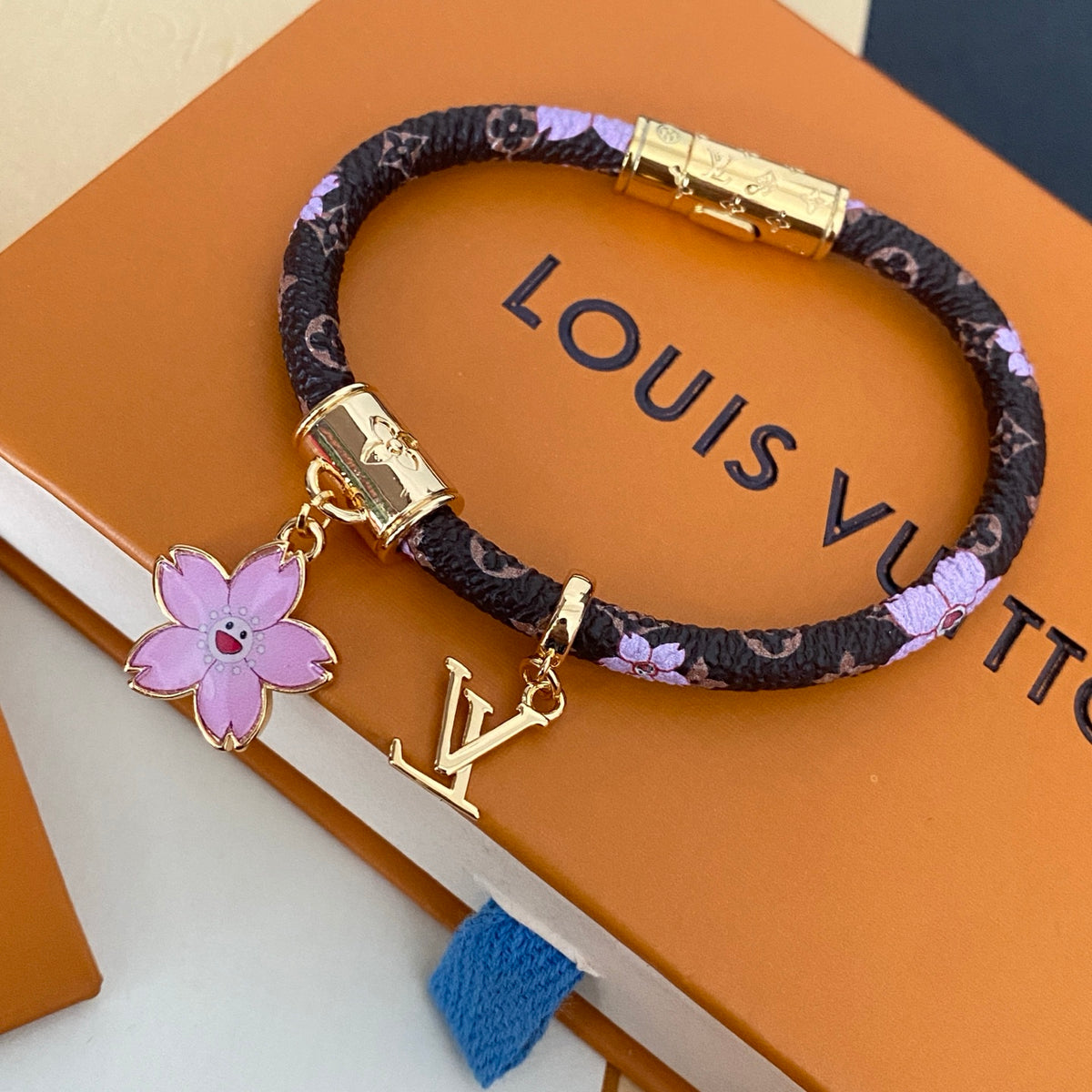 L Blossom Charm Cord Bracelet