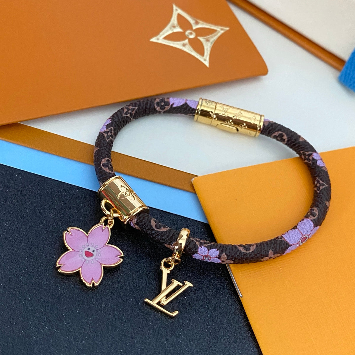 L Blossom Charm Cord Bracelet