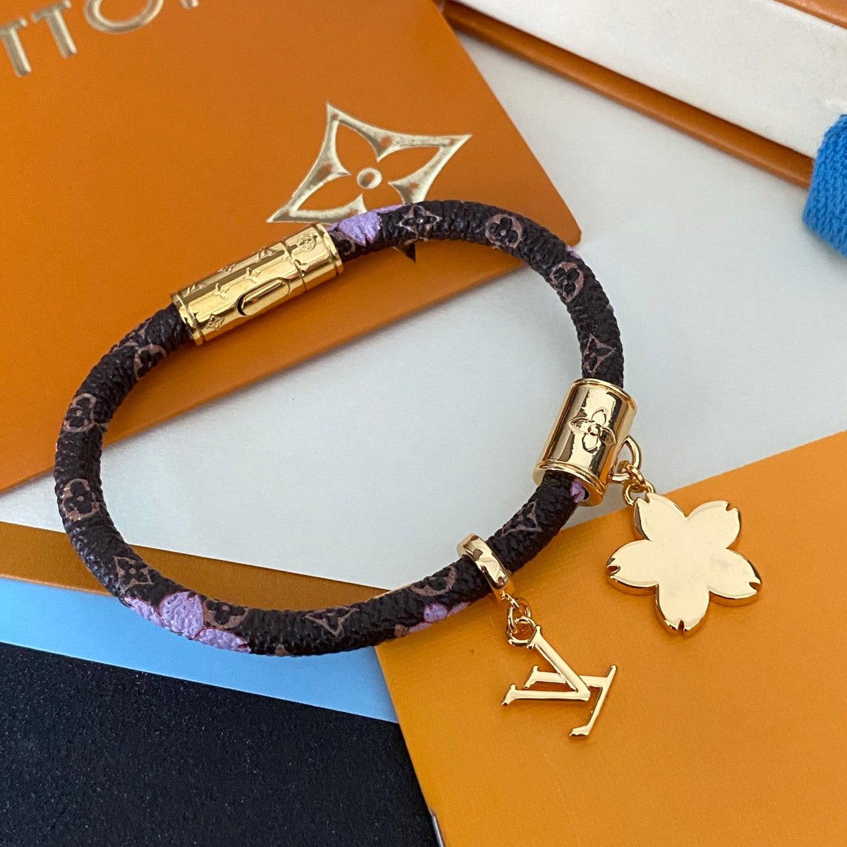 L Blossom Charm Cord Bracelet