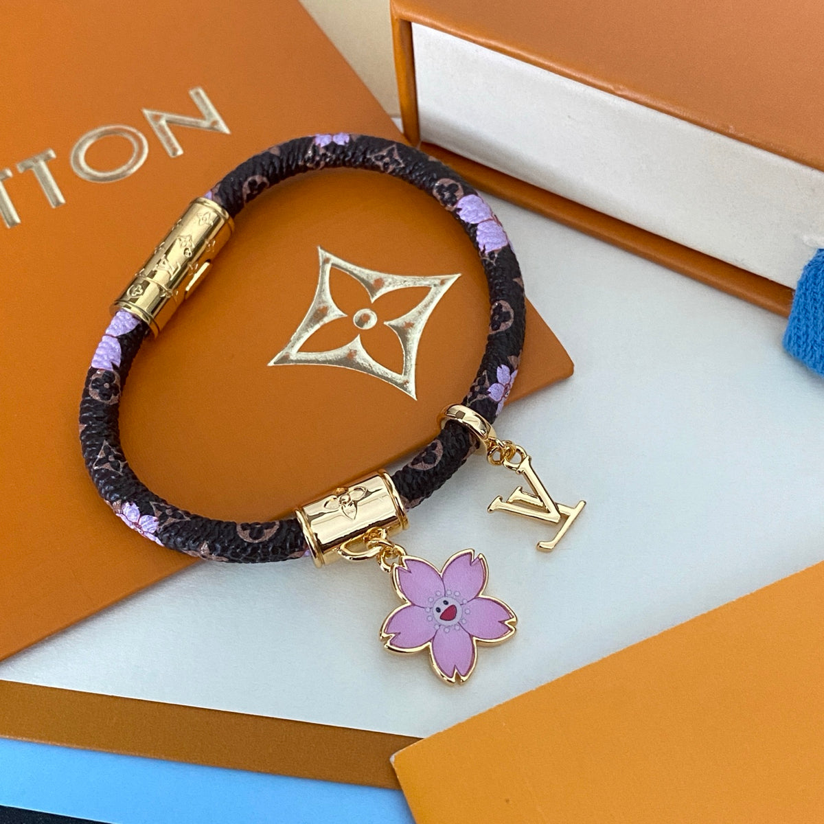 L Blossom Charm Cord Bracelet