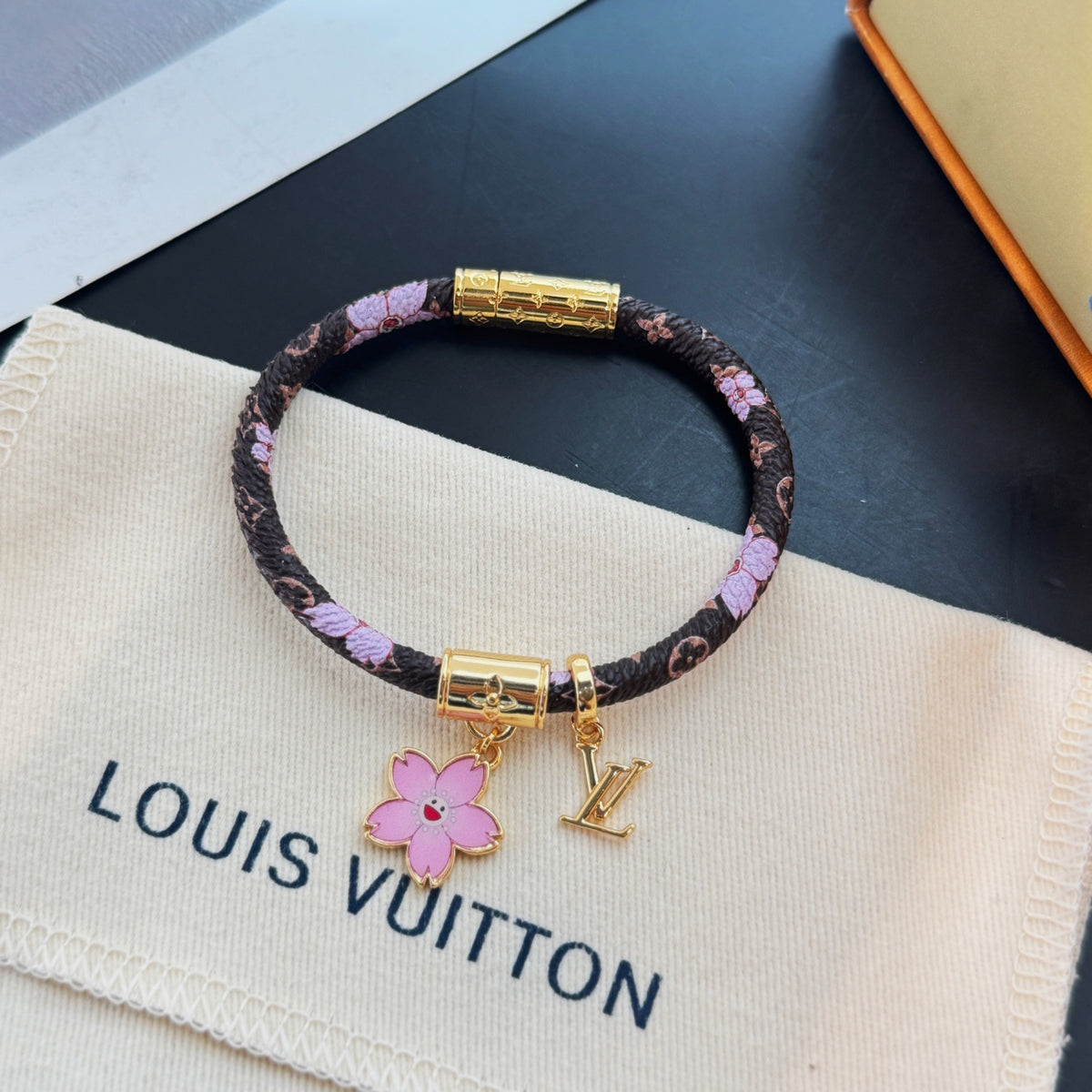 L Blossom Charm Cord Bracelet