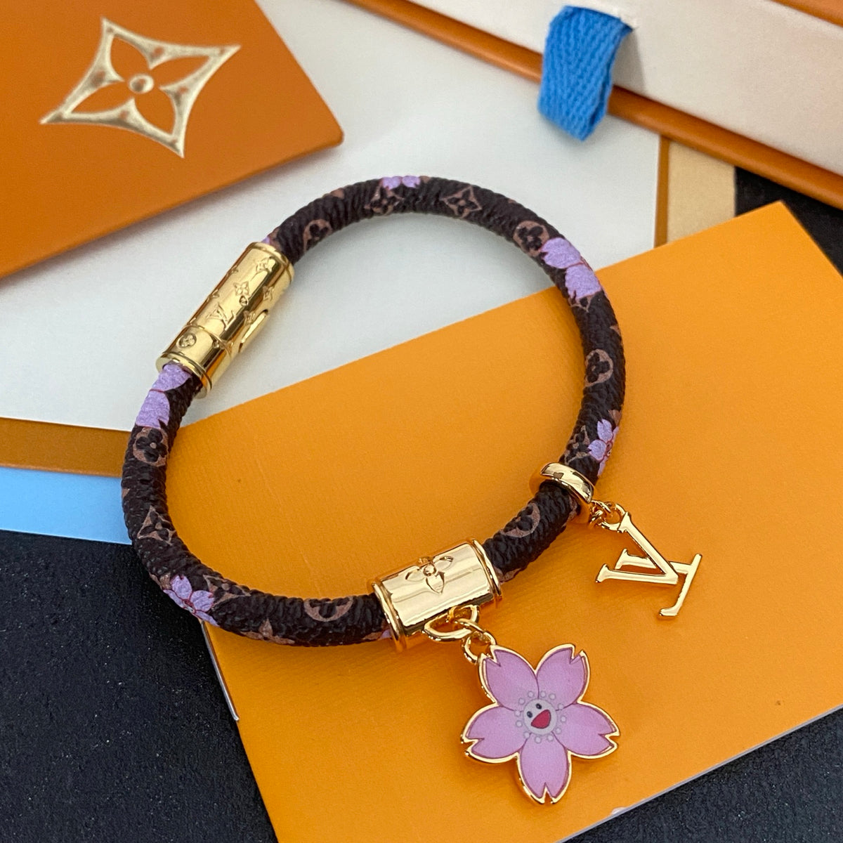 L Blossom Charm Cord Bracelet