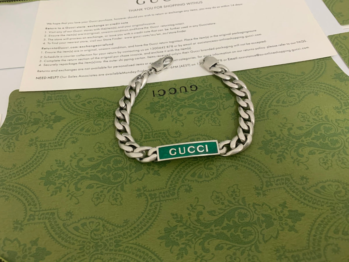 GU Green Enamel Interlock Bracelet