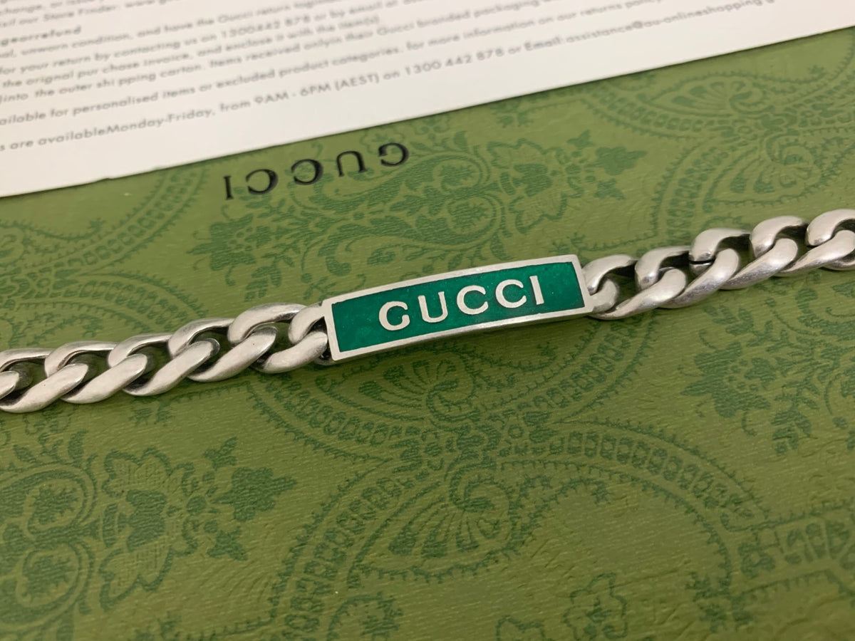 GU Green Enamel Interlock Bracelet