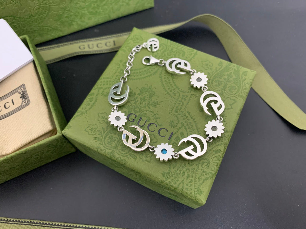 GU Turquoise Tone Floral Bracelet