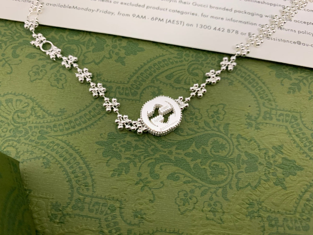 GU Snowflake Charm Bracelet