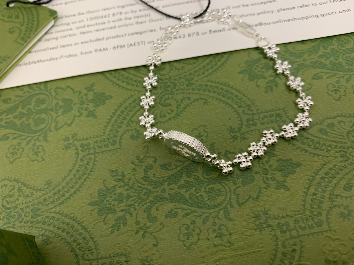 GU Snowflake Charm Bracelet