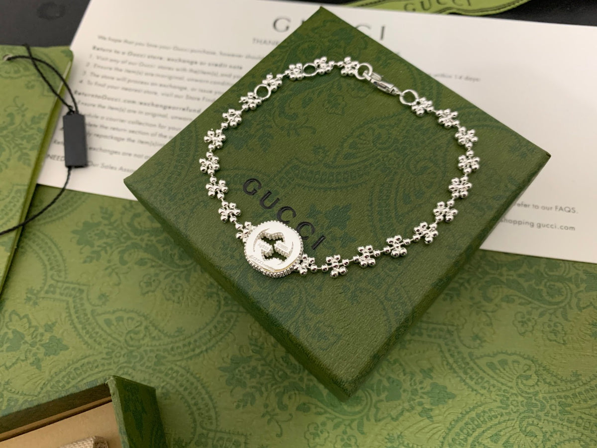 GU Snowflake Charm Bracelet